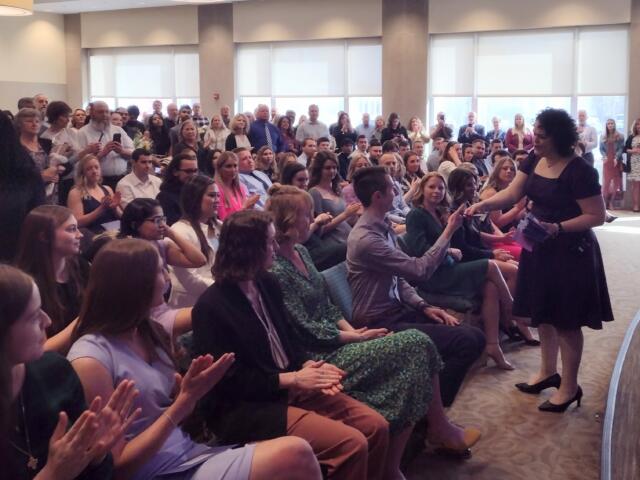 Dr. Haneme Idrizi, who is the Associate Dean for Student Affairs and Admissions at SIU Med, begins to hand out the purple envelopes that reveal a student's next destination.