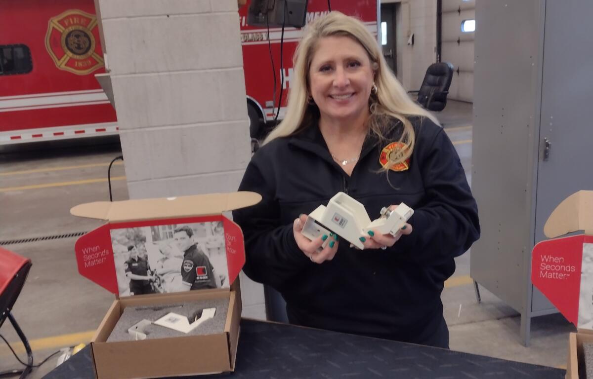 Denise Beauman with the Springfield Fire Dept. shows off the new Homebox kits